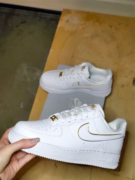 air force 1 white gold shoes.